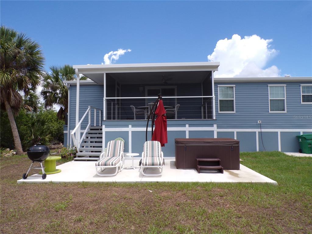 721 Marlin Drive Punta Gorda, FL 33950 - Photo 42 of 50 a front view of a house with patio