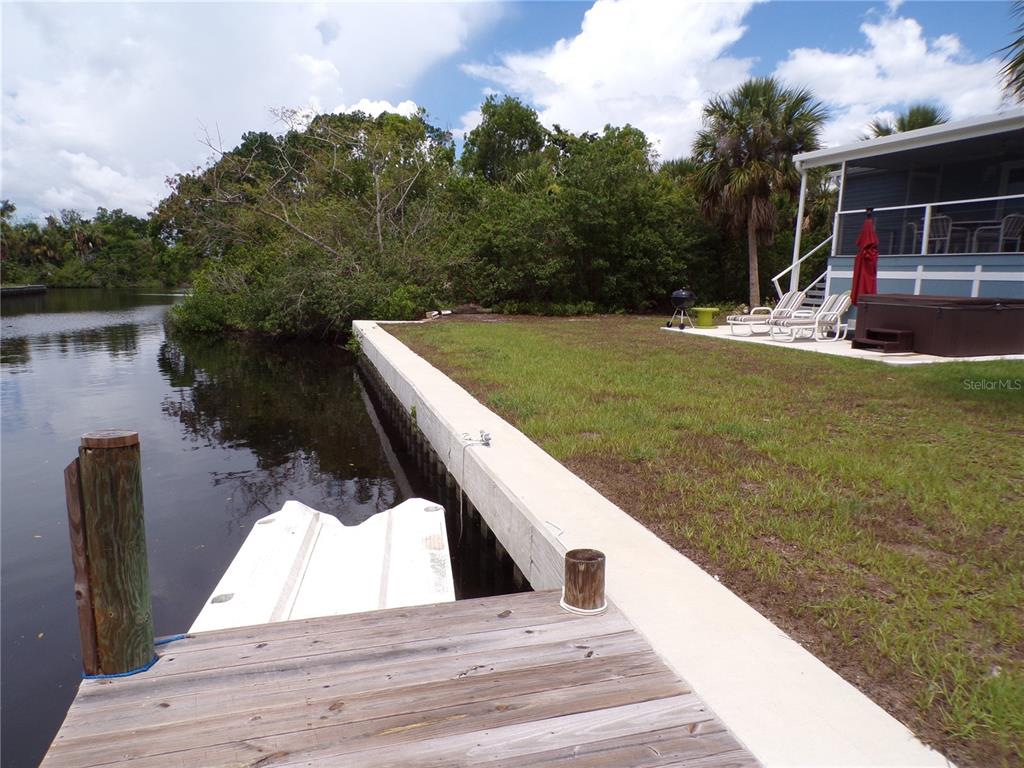 721 Marlin Drive Punta Gorda, FL 33950 - Photo 43 of 50 a view of swimming pool with a yard