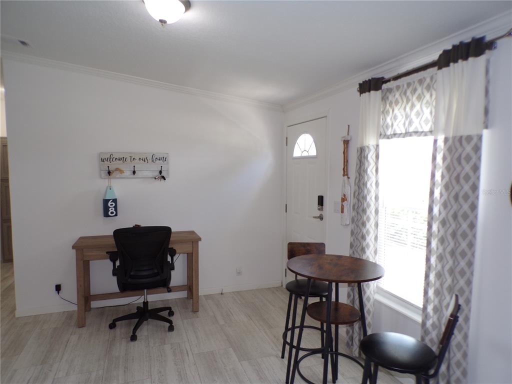721 Marlin Drive Punta Gorda, FL 33950 - Photo 5 of 50 a view of a workspace with furniture and a window