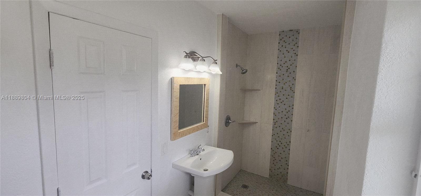 200 Northwest 9th Street Boca Raton, FL 33432 - Photo 31 of 61 a bathroom with a sink and toilet