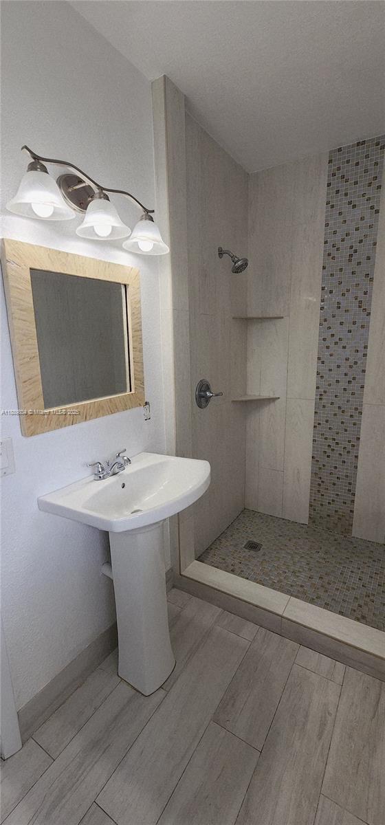 200 Northwest 9th Street Boca Raton, FL 33432 - Photo 33 of 61 a bathroom with a sink toilet and shower