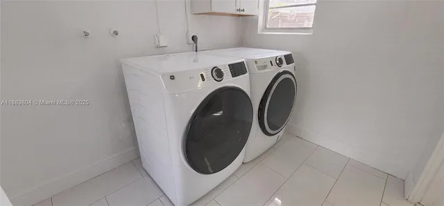 a view of a tree in a yard