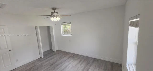 a view of a backyard with a small garden