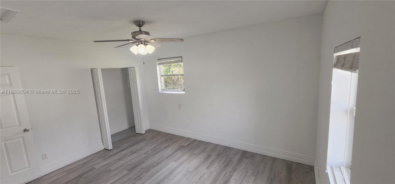 200 Northwest 9th Street Boca Raton, FL 33432 - Photo 41 of 61 a view of empty room with wooden floor