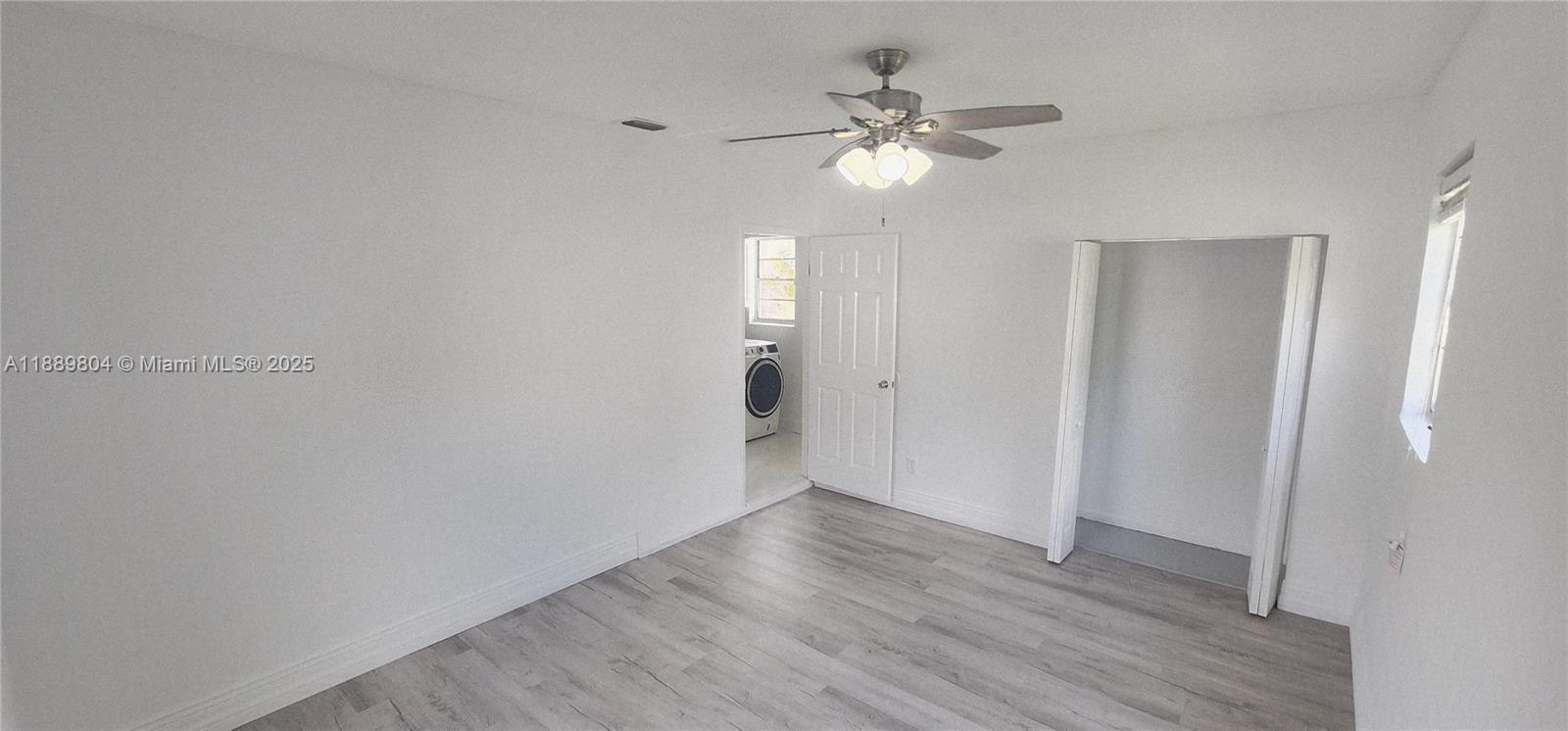 200 Northwest 9th Street Boca Raton, FL 33432 - Photo 43 of 61 a view of an empty room with wooden floor