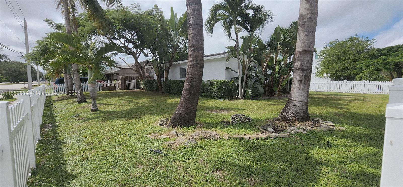 200 Northwest 9th Street Boca Raton, FL 33432 - Photo 47 of 61 a view of a tree in a yard
