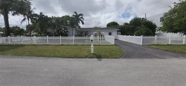a view of an ocean and a yard