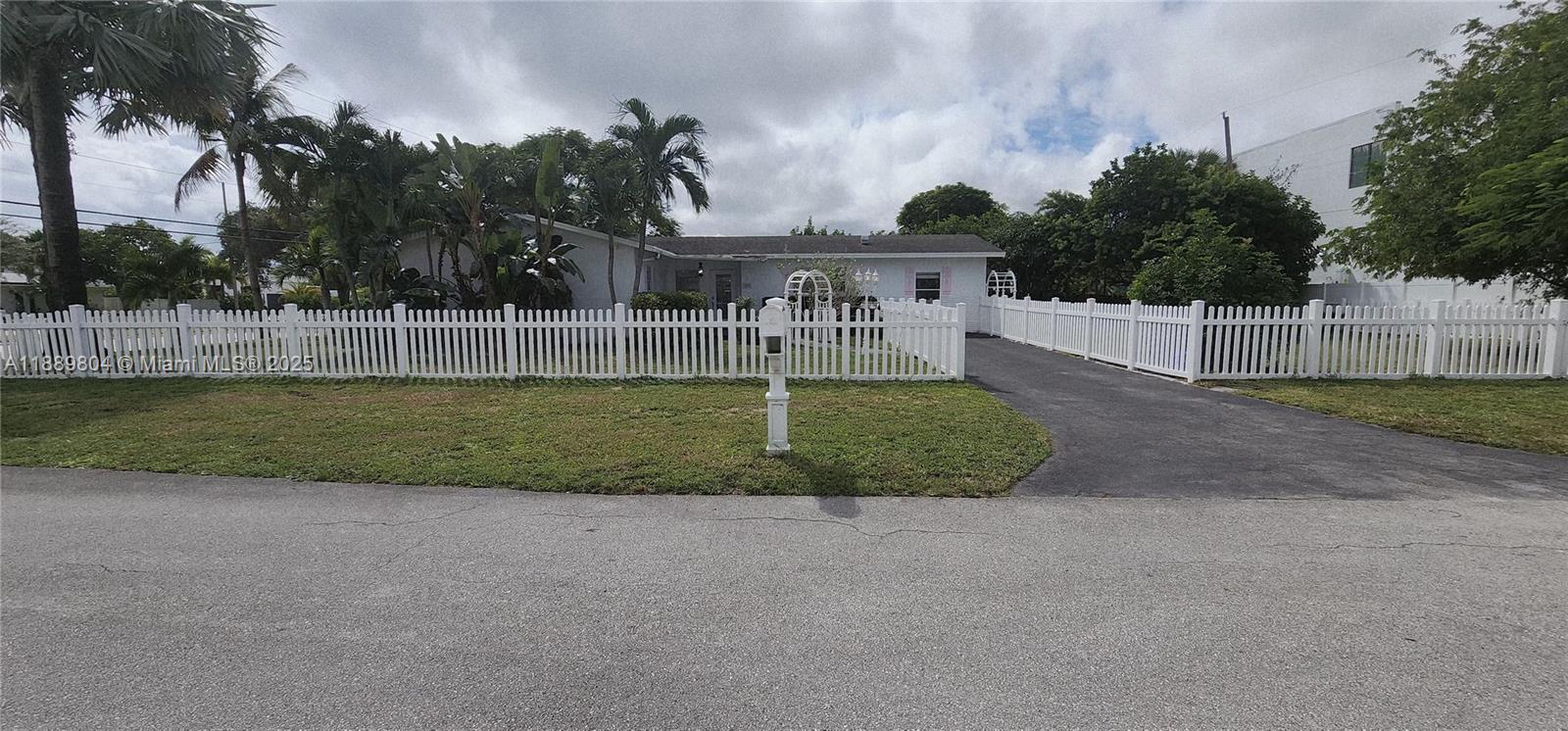 200 Northwest 9th Street Boca Raton, FL 33432 - Photo 50 of 61 a view of a backyard with large trees