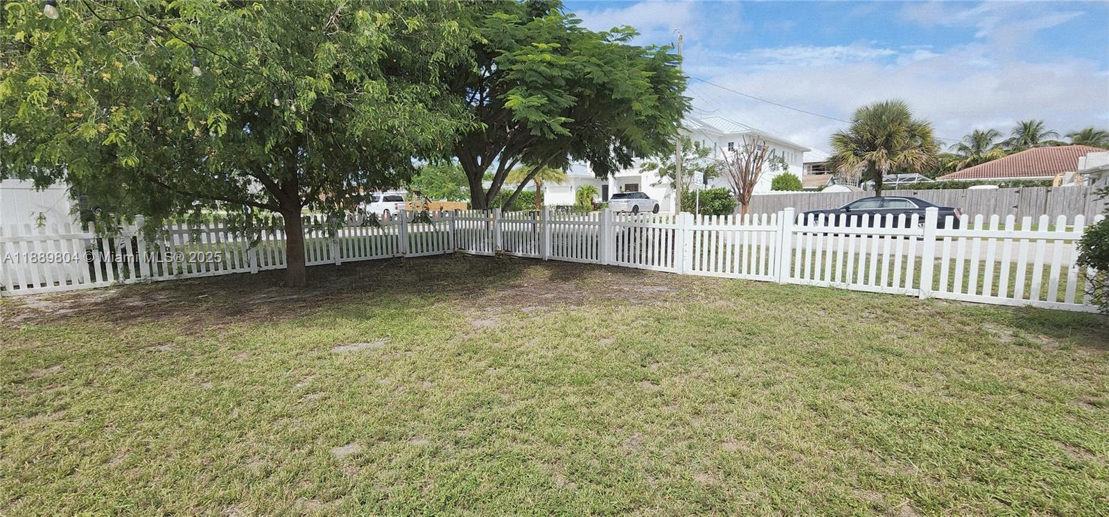 200 Northwest 9th Street Boca Raton, FL 33432 - Photo 56 of 61 a view of a yard with wooden fence
