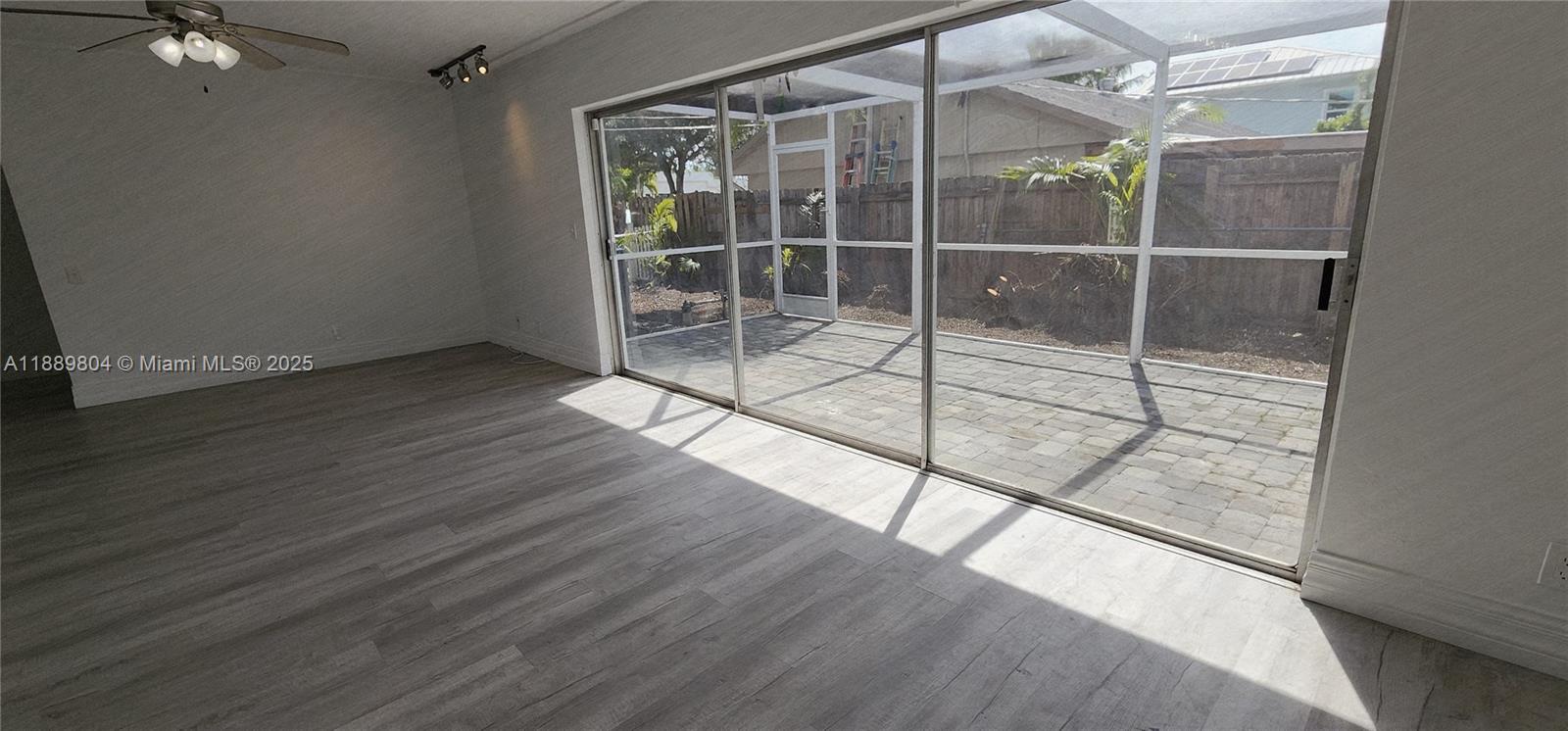 200 Northwest 9th Street Boca Raton, FL 33432 - Photo 6 of 61 a bathroom with a glass shower door