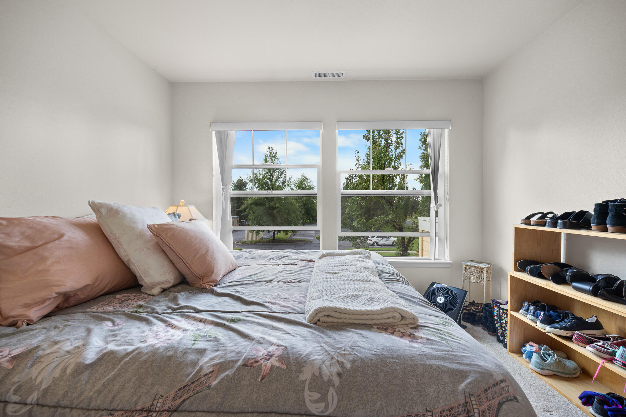 624 Southwest Hill Street Bend, OR 97702 - Photo 32 of 45 a bedroom with a bed and a window