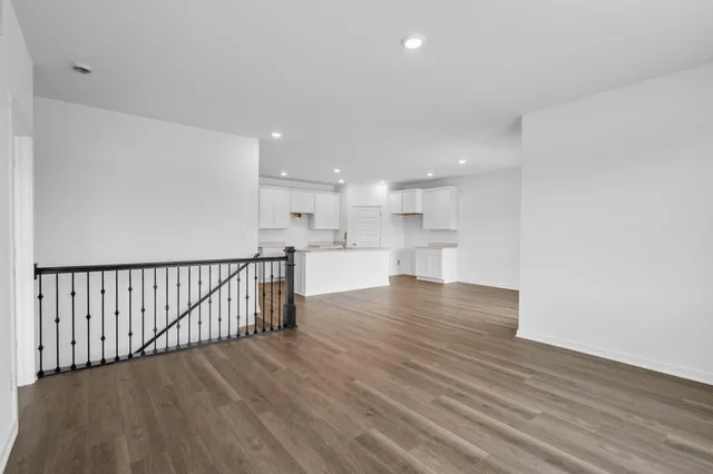 a view of kitchen with wooden floor