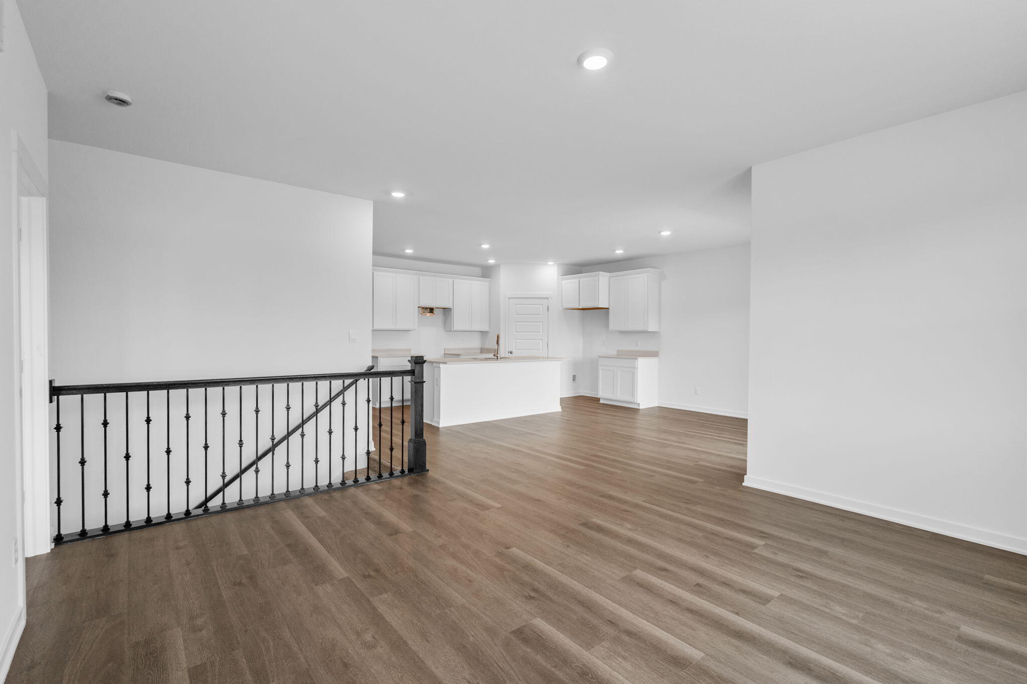 7602 West 106th Place Crown Point, IN 46307 - Photo 7 of 22 a view of kitchen with wooden floor