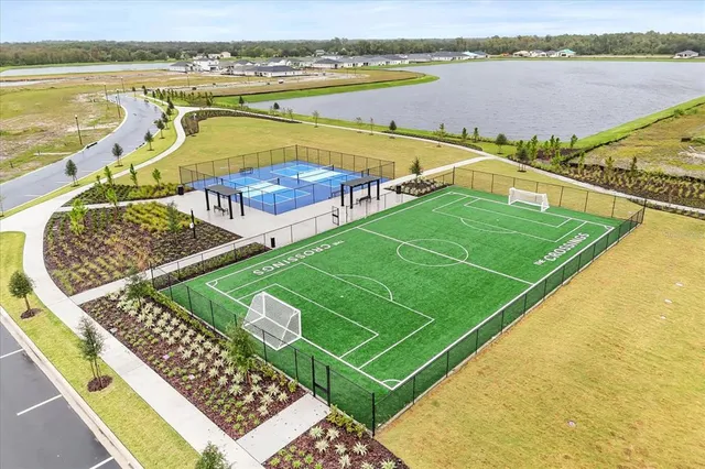 a view of a balcony with an outdoor seating space