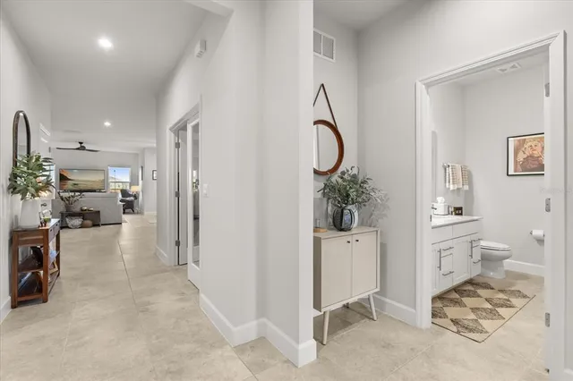 a view of a walk in closet and bedroom