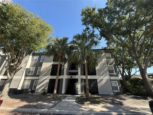 a view of a house with a street