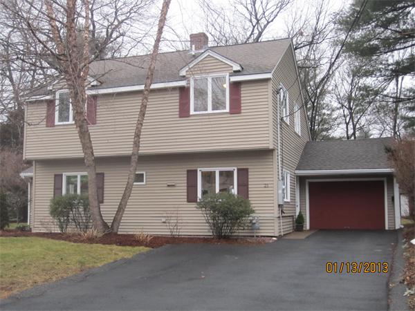21 Longfellow Road Natick, MA 01760 - Photo 3 of 28 a front view of a house with a yard and garage