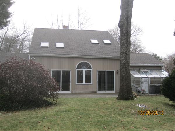 21 Longfellow Road Natick, MA 01760 - Photo 4 of 28 front view of a house with a yard