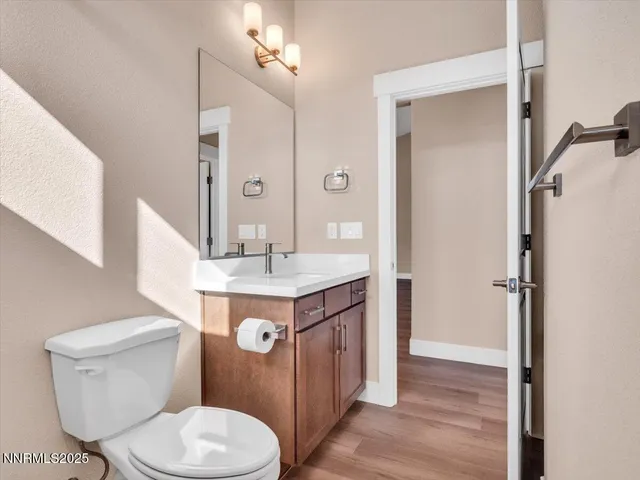 a bathroom with a sink a toilet and bathtub