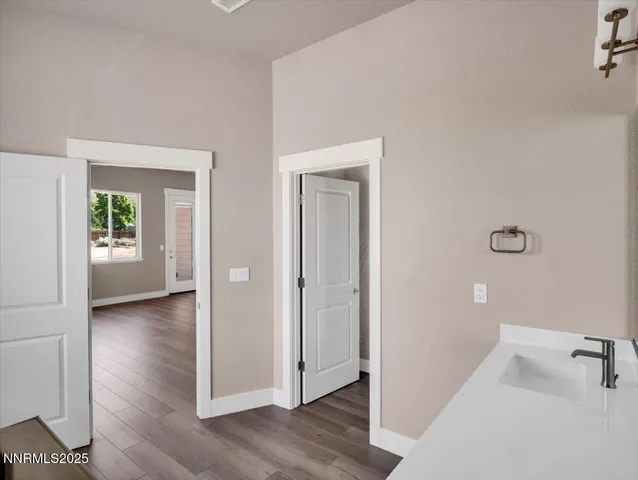 a view of bathroom with a tub shower and sink