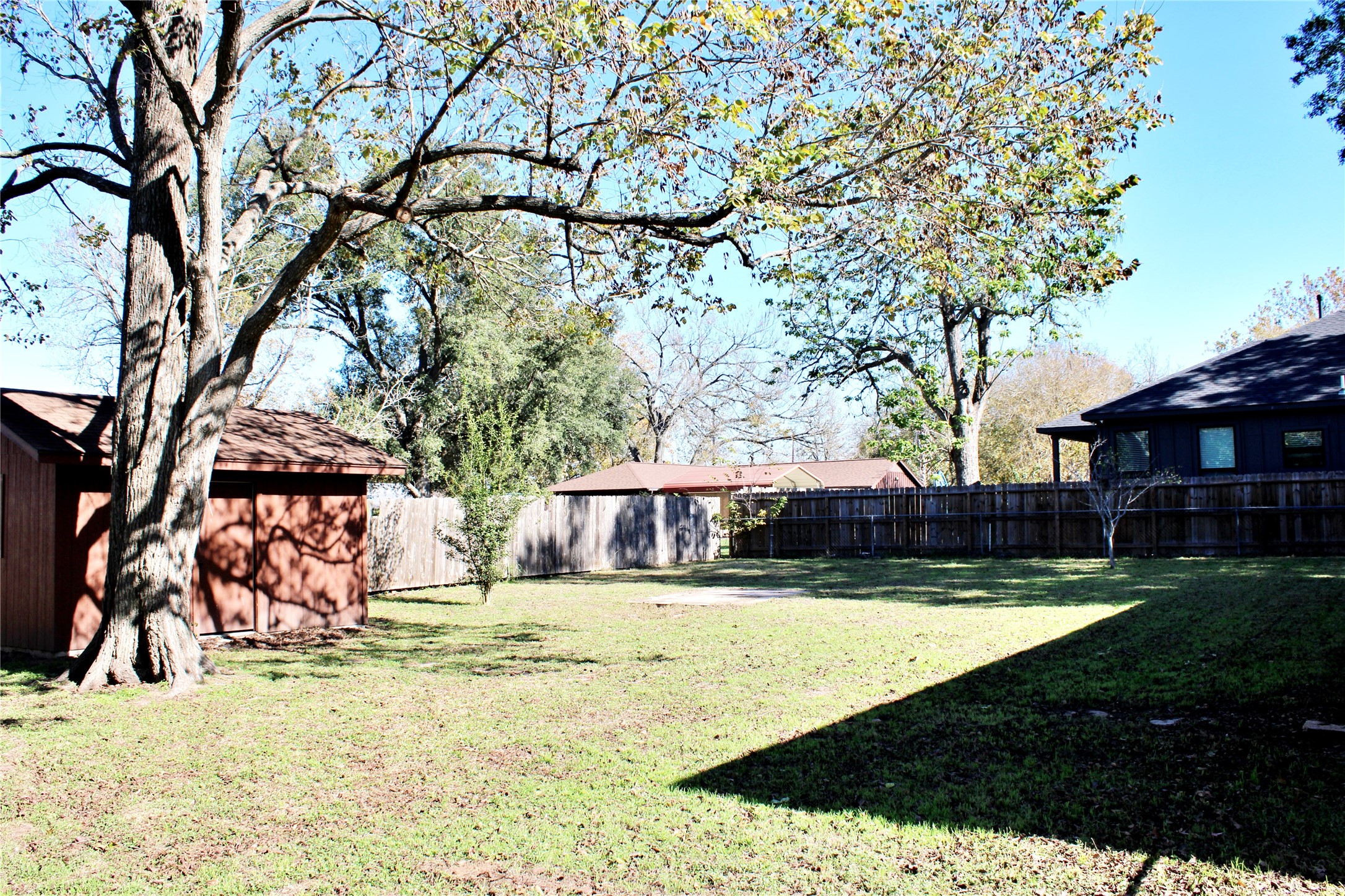 1126 Jackson Street Columbus, TX 78934 - Photo 34 of 40 a view of swimming pool with lawn chairs and plants