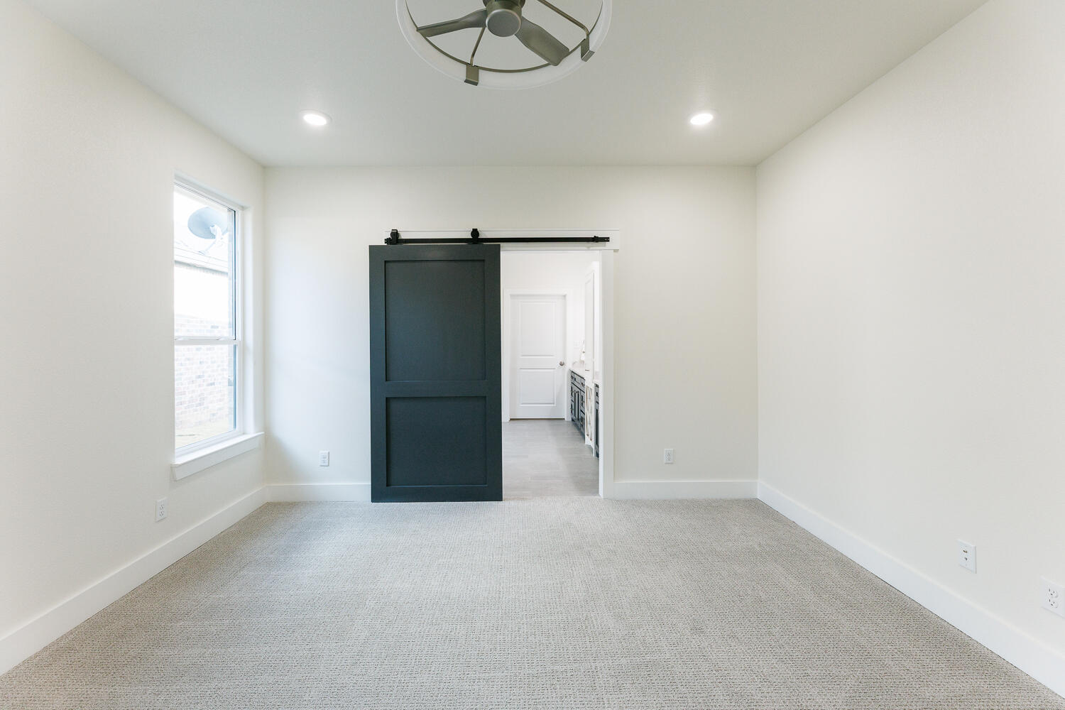 3819 58th Street Lubbock, TX 79413 - Photo 30 of 63 an empty room with windows and closet
