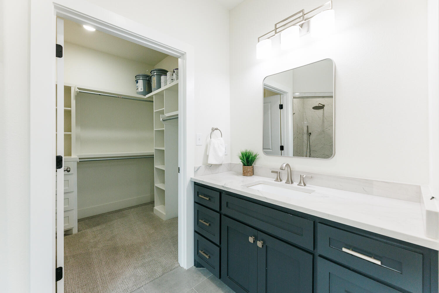 3819 58th Street Lubbock, TX 79413 - Photo 38 of 63 a bathroom with a double vanity sink mirror and double