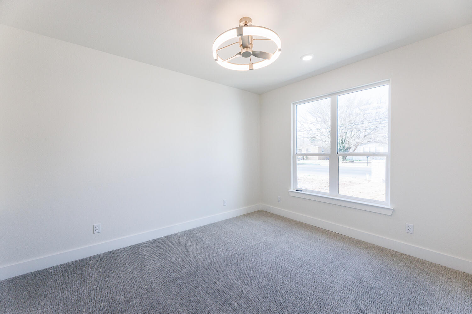 3819 58th Street Lubbock, TX 79413 - Photo 46 of 63 an empty room with a window