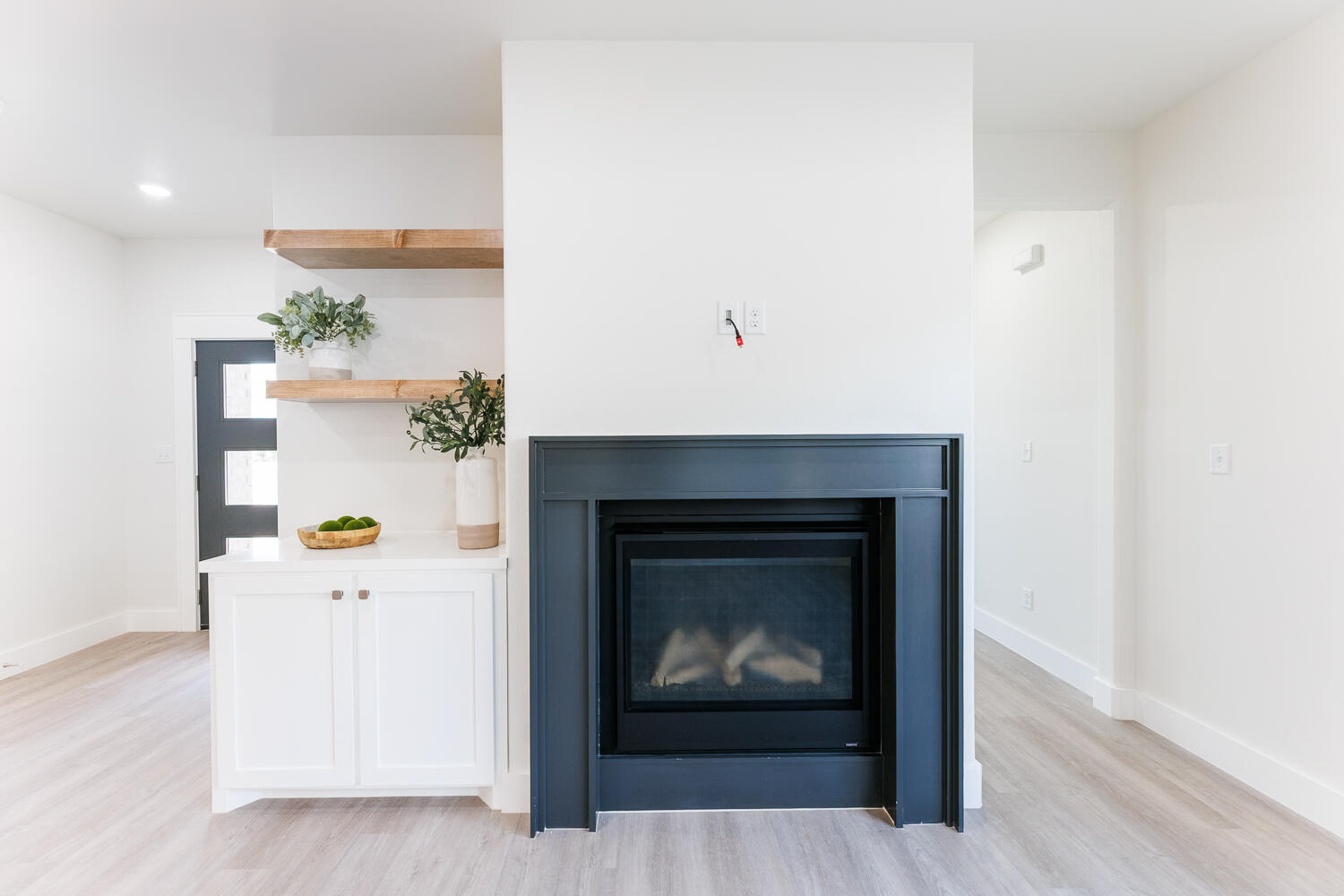 3819 58th Street Lubbock, TX 79413 - Photo 8 of 63 a living room with furniture and a fireplace