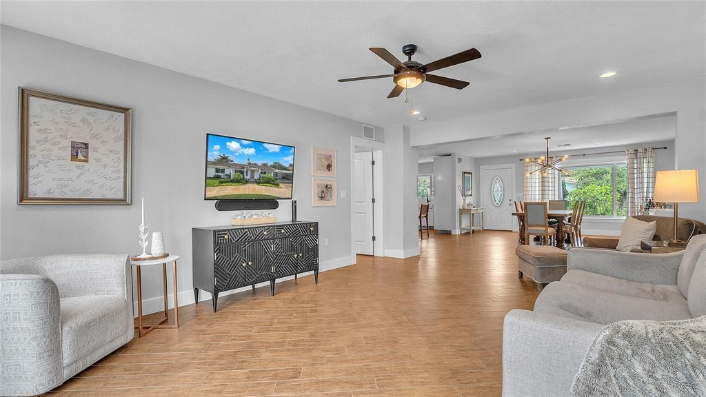 2800 Northeast 53rd Street Lighthouse Point, FL 33064 - Photo 19 of 34 a living room with furniture and a window