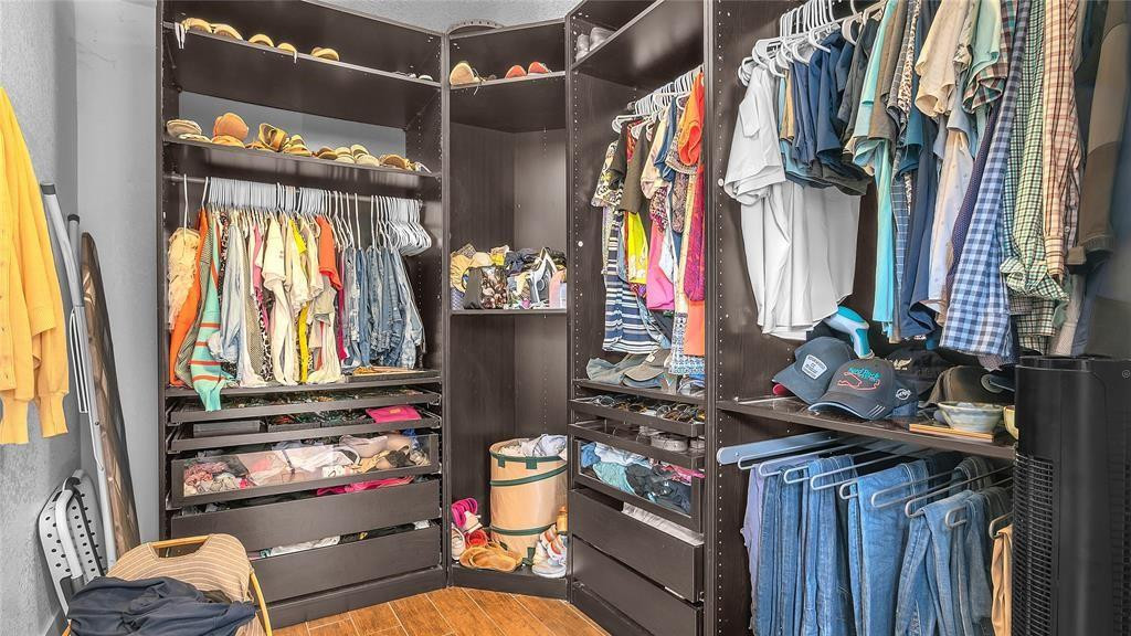 2800 Northeast 53rd Street Lighthouse Point, FL 33064 - Photo 24 of 34 a view of walk in closet with clothes