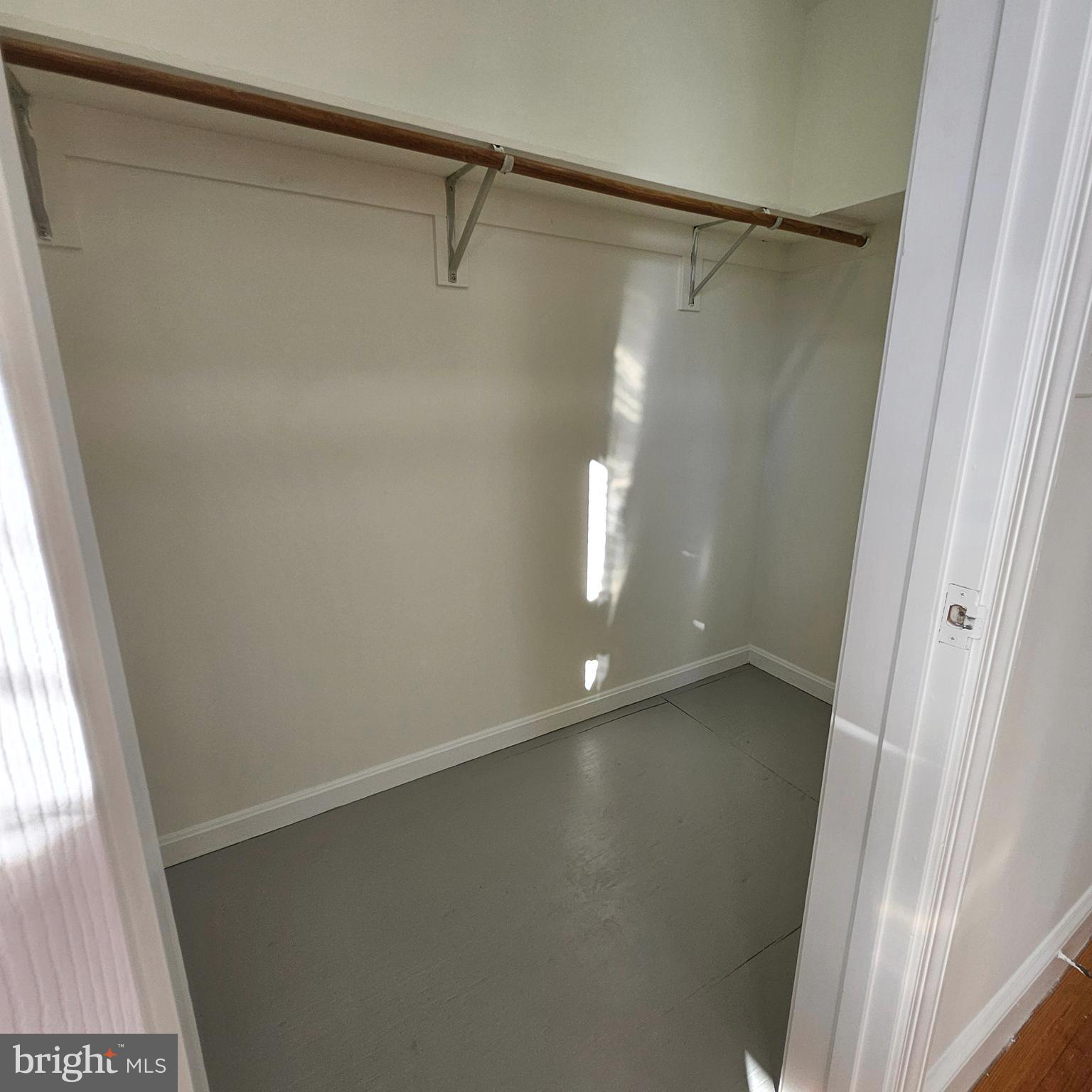 5338 42nd Street Northwest Washington, DC 20015 - Photo 15 of 22 a view of an empty room with wooden floor and a window