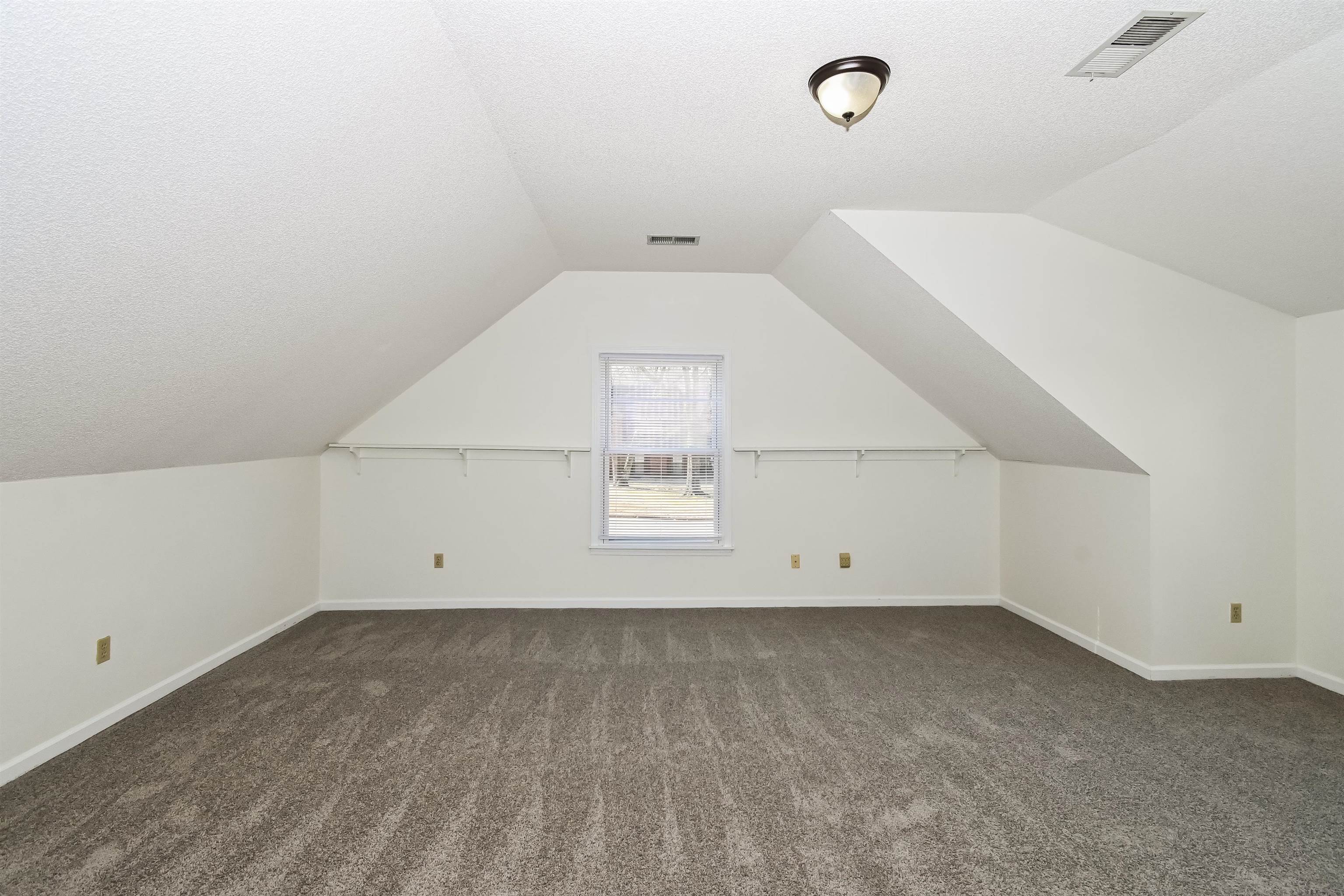 3656 Beaver Run Drive Collierville, TN 38017 - Photo 11 of 18 Bonus room with dark carpet and a textured ceiling