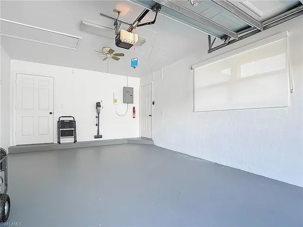 a view of a patio with a table chairs and a table