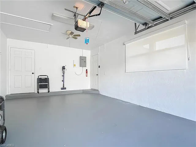 a view of a patio with a table chairs and a table