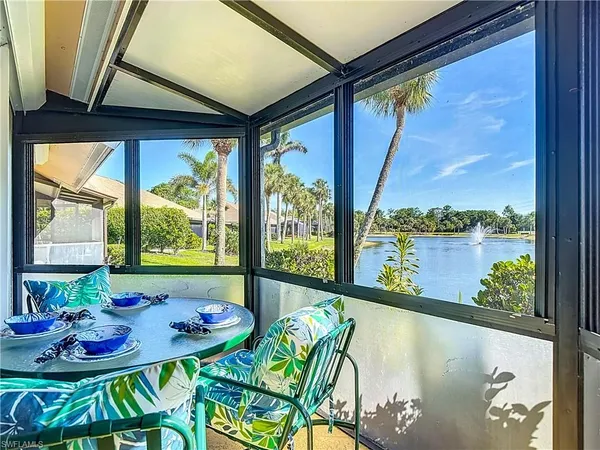 a view of an outdoor dining space with furniture