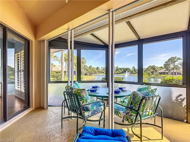 a view of a lake with a yard