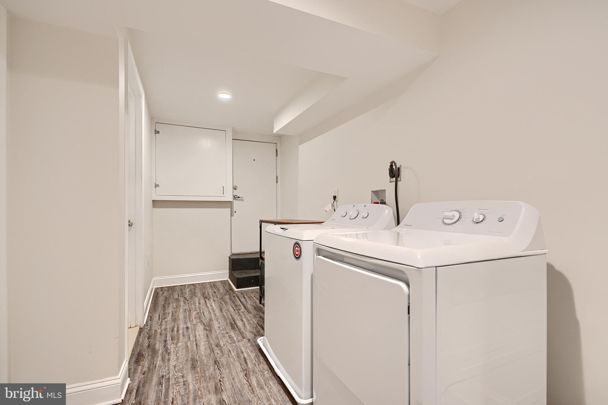 119 South Potomac Street Baltimore, MD 21224 - Photo 18 of 26 a utility room with dryer and washer