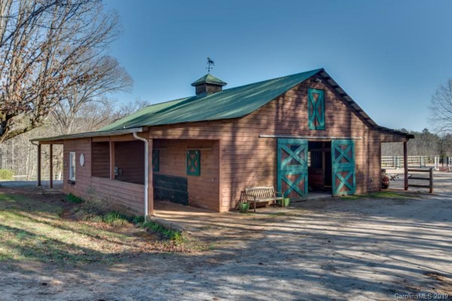 435 Landrum Road Columbus, NC 28722 - Photo 13 of 22 a front view of a house with a yard