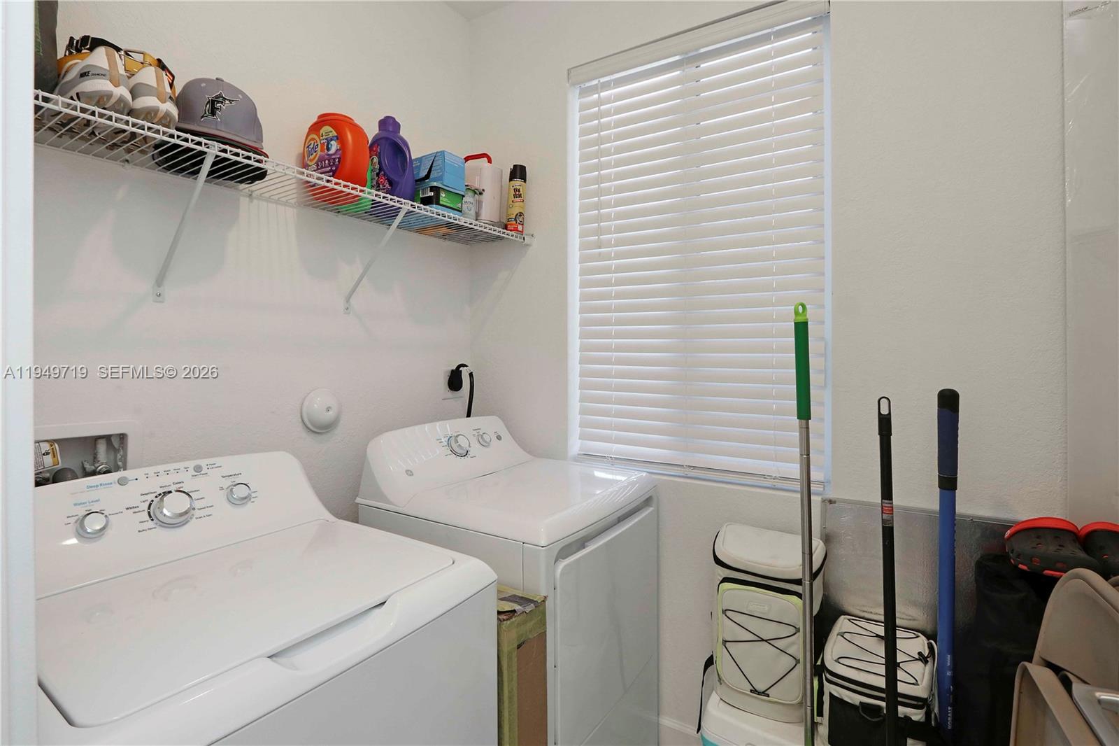 2432 Southeast 10th Street Homestead, FL 33035 - Photo 13 of 30 a utility room with dryer and washer