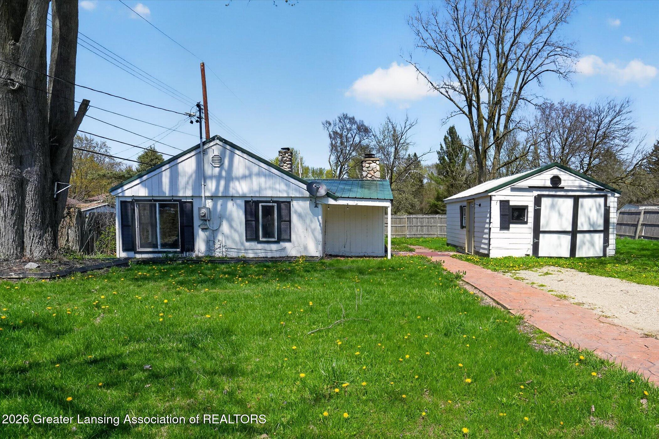 3024 West Jolly Road Lansing, MI 48911 - Photo 1 of 37 02-3024-W-Jolly-Rd-WindowStill-Real-Esta