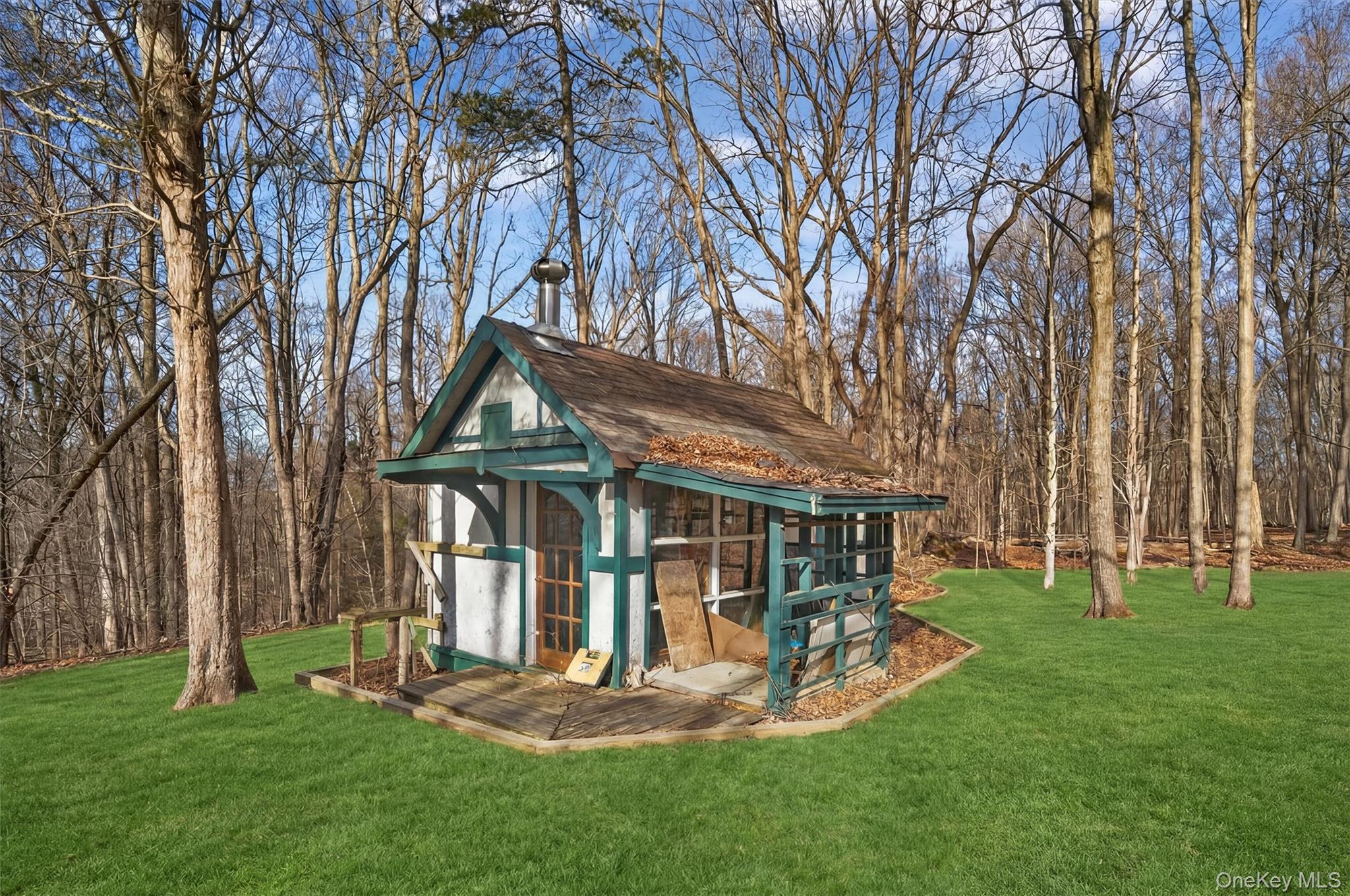 48 Chardavoyne Road Warwick, NY 10990 - Photo 15 of 22 a view of house with a big yard and large trees