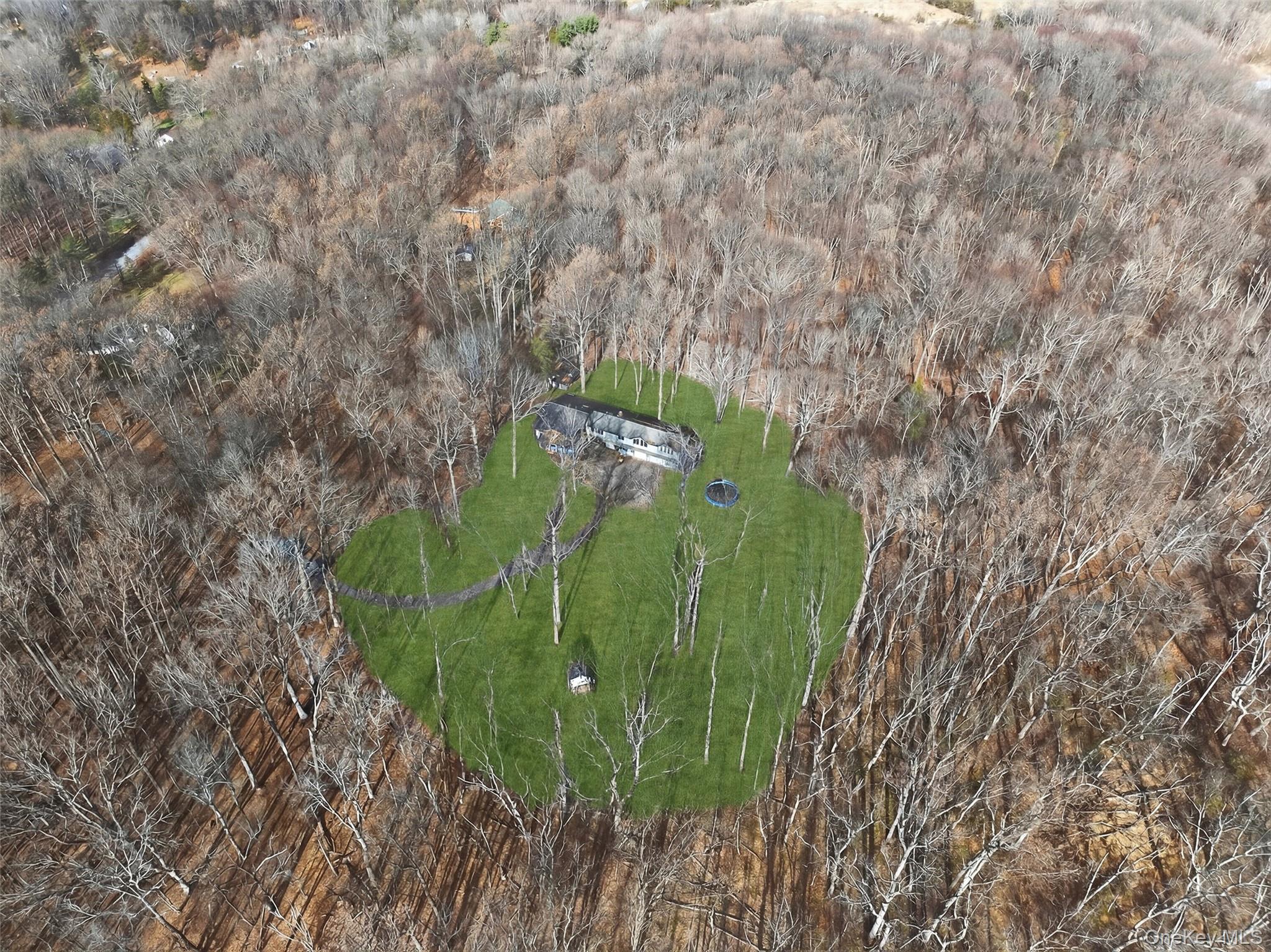 48 Chardavoyne Road Warwick, NY 10990 - Photo 18 of 22 a green field with lots of trees in the background