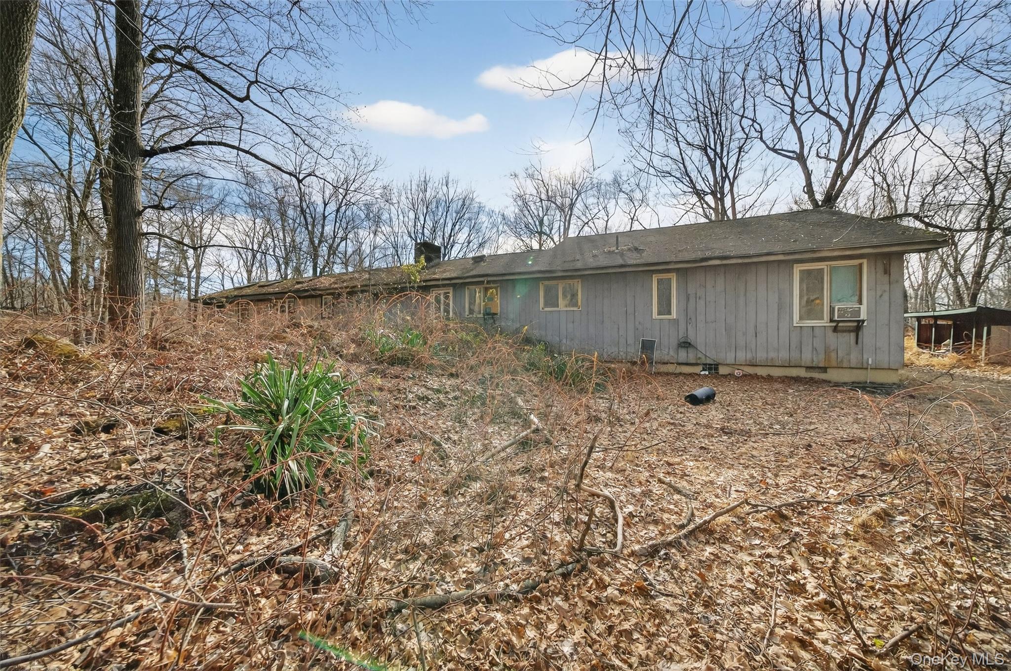 48 Chardavoyne Road Warwick, NY 10990 - Photo 19 of 22 a backyard of a house with lots of green space