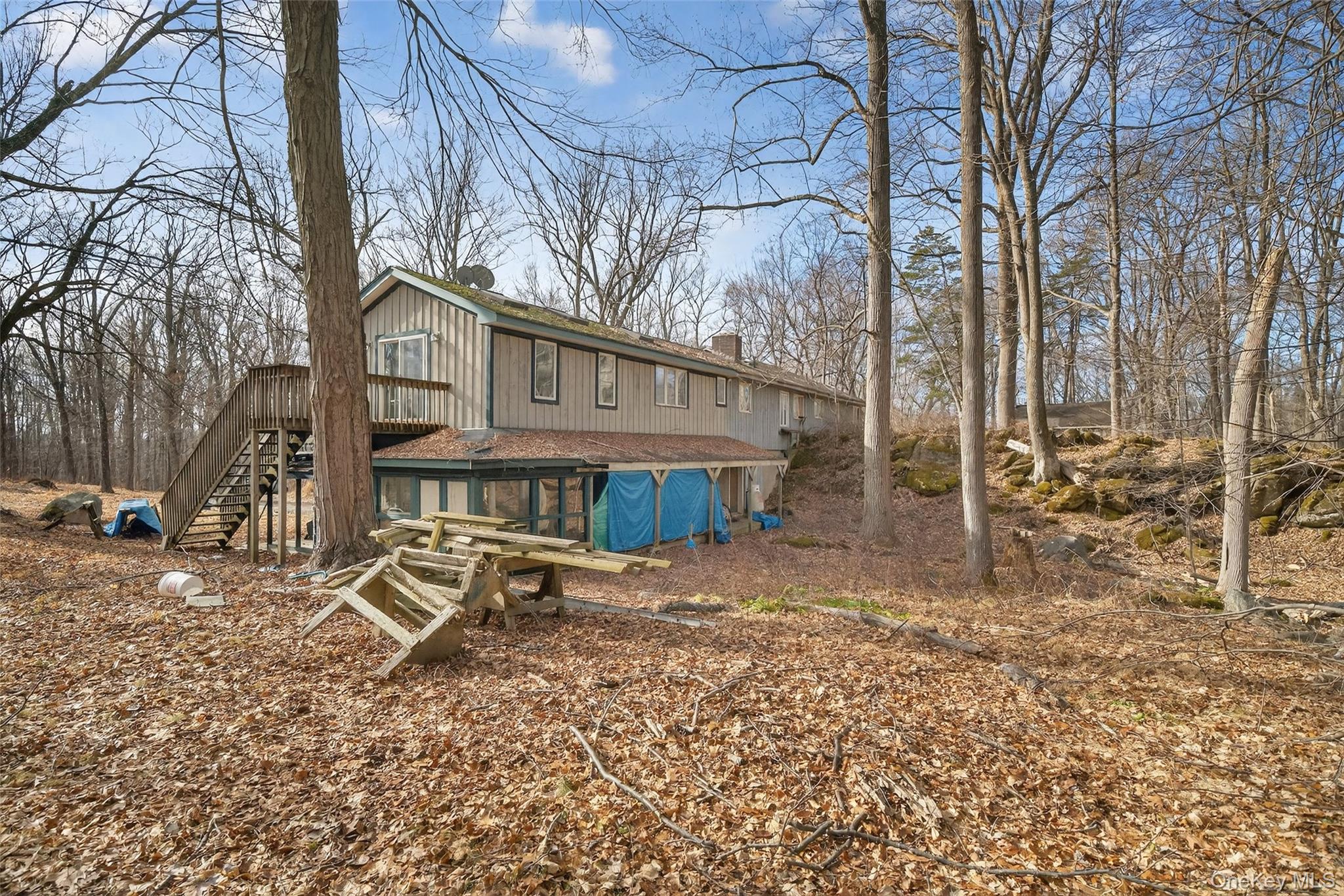 48 Chardavoyne Road Warwick, NY 10990 - Photo 20 of 22 a house that has a tree in front of it