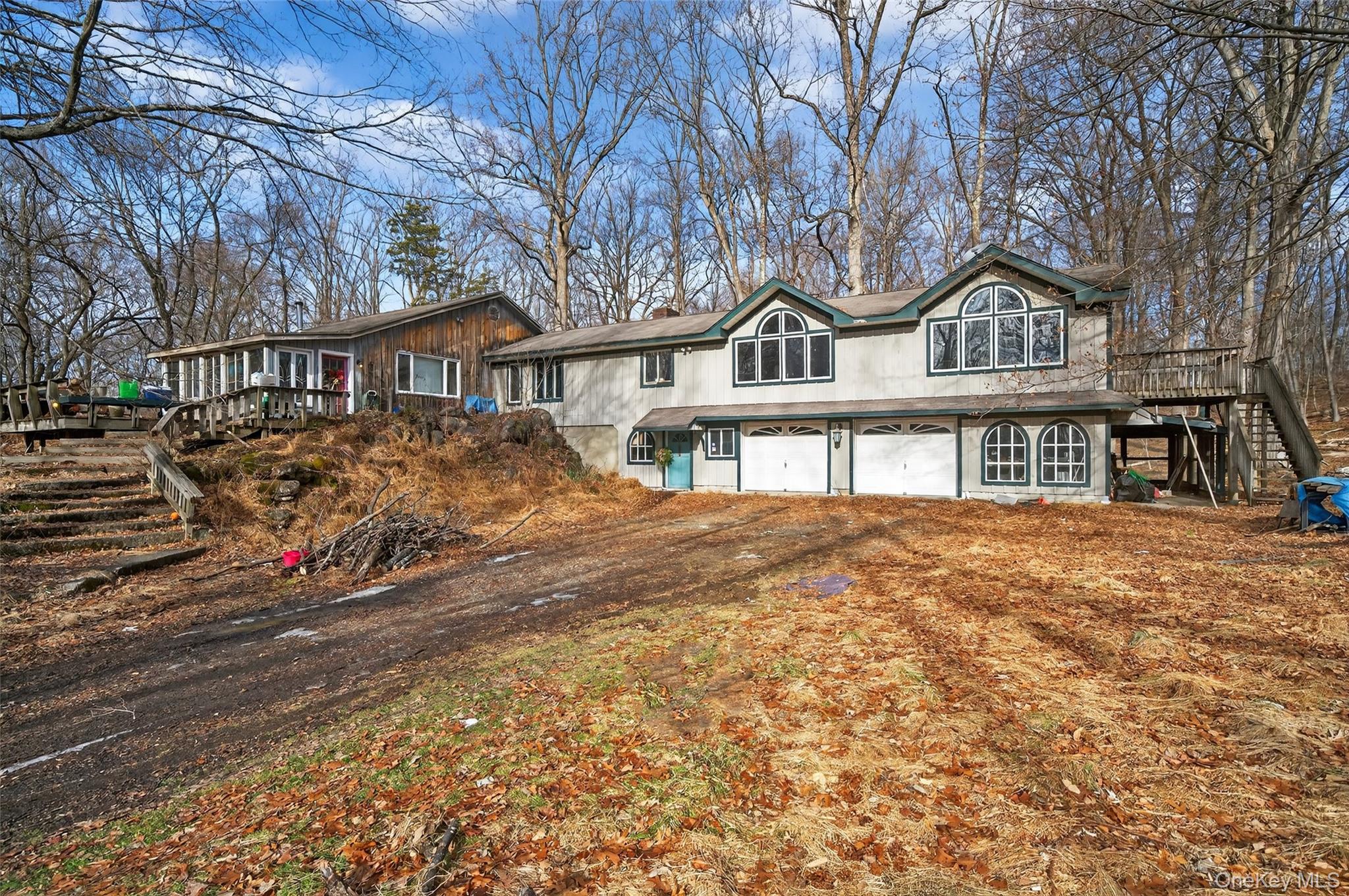 48 Chardavoyne Road Warwick, NY 10990 - Photo 2 of 22 a front view of a house with a large tree