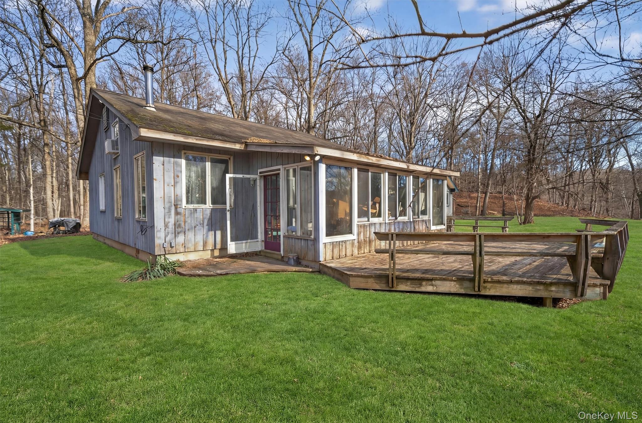 48 Chardavoyne Road Warwick, NY 10990 - Photo 6 of 22 a view of a house with backyard and wooden fence