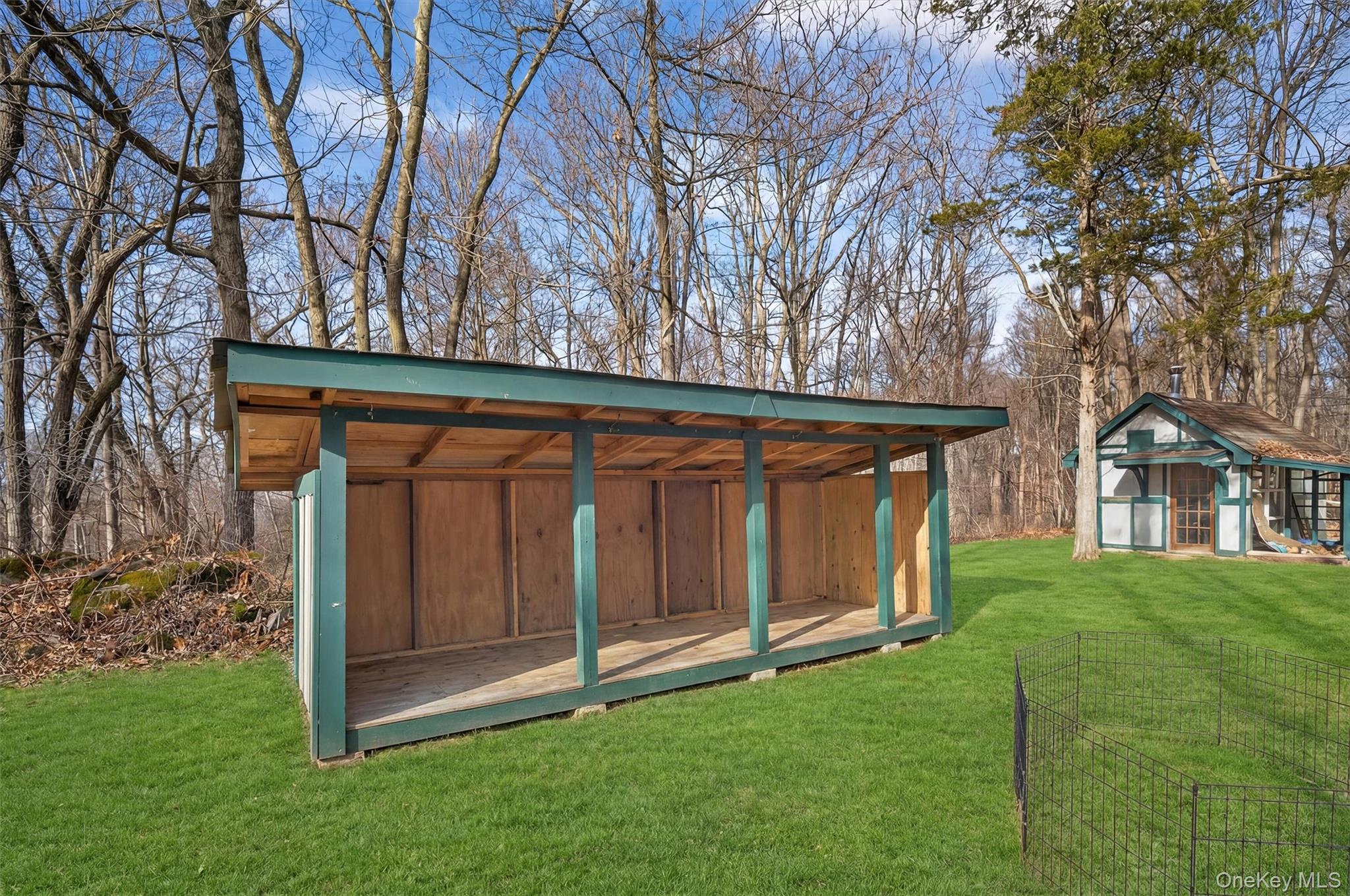 48 Chardavoyne Road Warwick, NY 10990 - Photo 10 of 22 a view of backyard with large trees and a small yard
