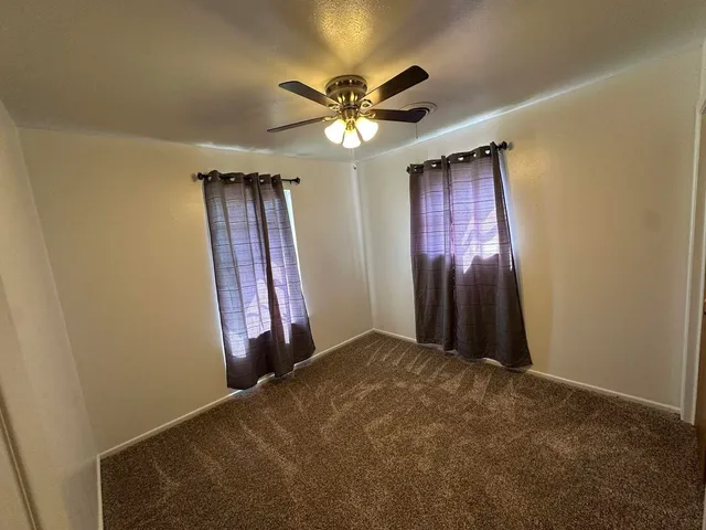 a view of a yard with an outdoor space