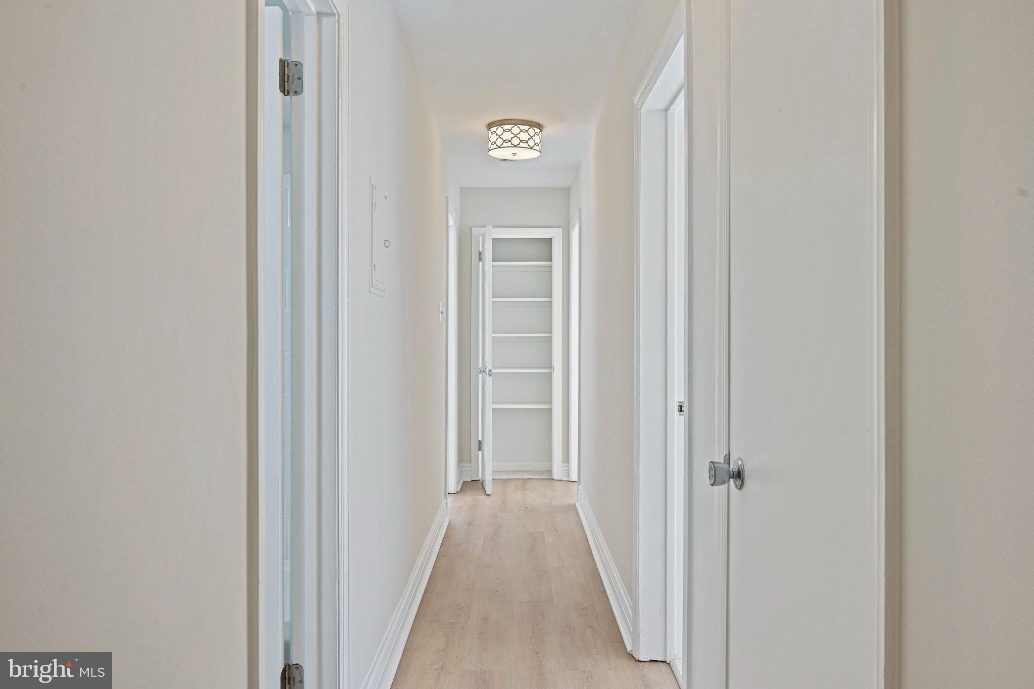 11625 Vantage Hill Road, Unit C Reston, VA 20190 - Photo 12 of 35 a view of a hallway with windows and closet
